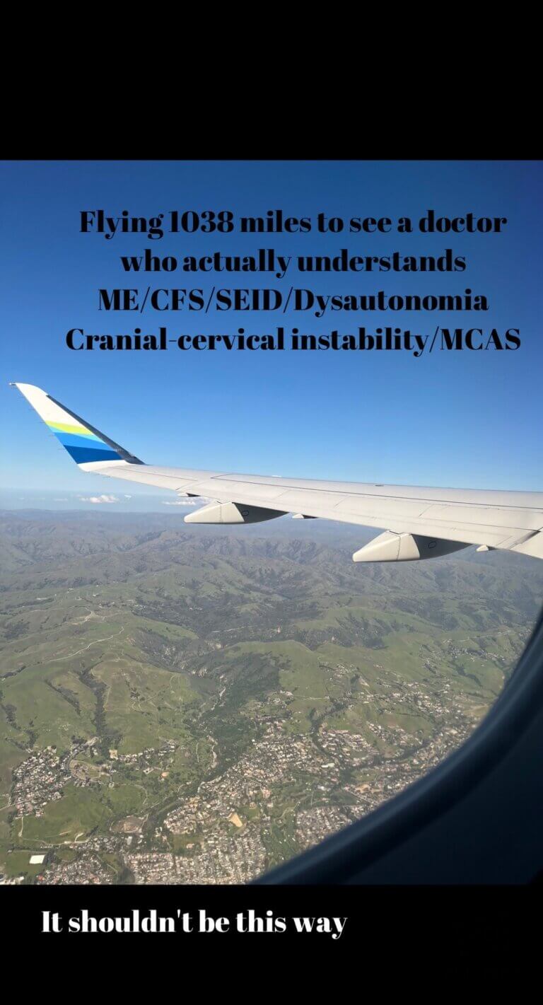 Photo of airplane wing flying over mountain range. Above it reads, “1038 miles to see a doctor who understands ME/CFS/SEID/Dysautonomia Cranial-servical instability/MCAS”. Below wing it reads, “It shouldn’t be this way”.