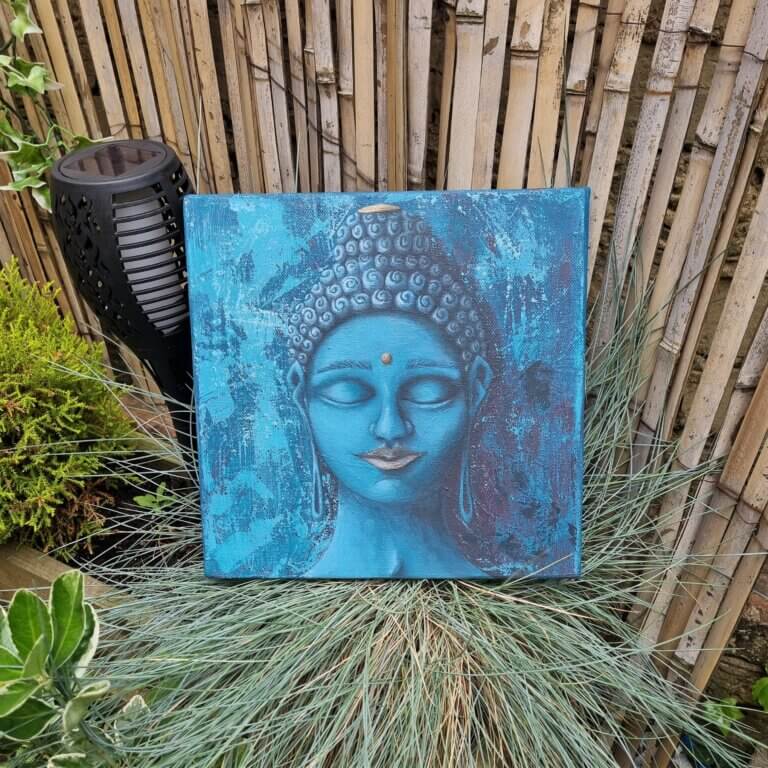 A blue painting of a South Asian Goddess