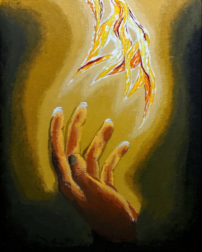 Hands touching an orange flame