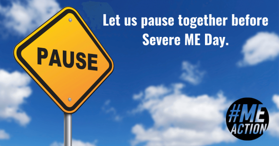 A sign that says pause against the backdrop of a blue sky. Let us pause together before Severe ME Day.