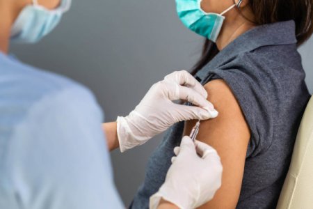 Person getting a vaccine shot